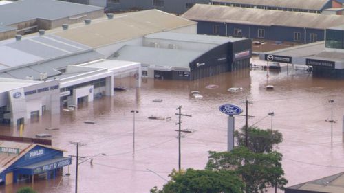 The NSW Premier will announce grants of $20,000 for flood-affected households in eight local government areas.