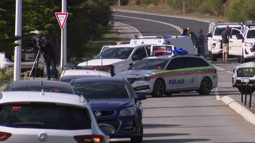 A Perth school is in lockdown after a teenage boy allegedly fired a gun in the carpark.