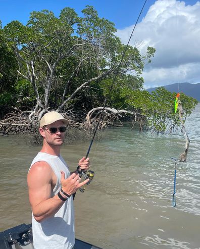 Chris Hemsworth roasted by mate as his fishing line gets caught in a tree during fishing trip.