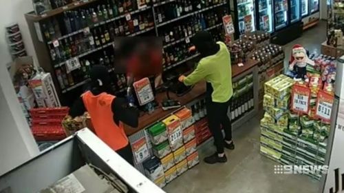 The thieves waved a gun directly at the bottle shop worker.