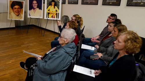 Family members of the victims of the "Days Inn" cold case murders listen as the Indiana State Police announces the identity of the suspect in the during a press conference in Indianapolis, Tuesday, April 5, 2022. Police identified the suspect as Harry Edward Greenwell more than 30 years after three women were killed and another assaulted using investigative genealogy.