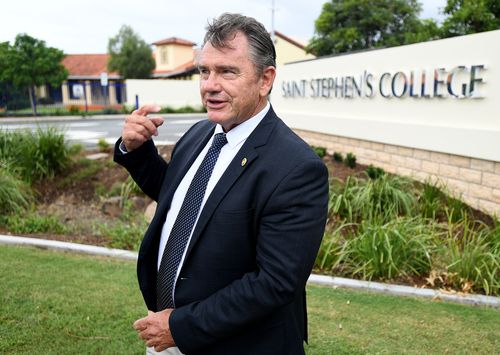 Saint Stephens College headmaster Jamie Dorrington talks to the media out front of the school yesterday. (AAP)