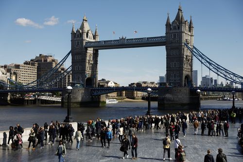 Members of the public queue near Tower Bridge, to see Queen Elizabeth II.