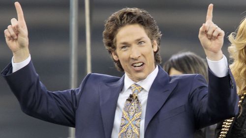 2010 file photo shows Lakewood Church pastor Joel Osteen at Dodger Stadium during his "A Night of Hope" in Los Angeles. (Associated Press)