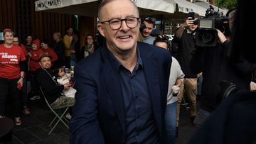 Photographs show the newly minted Australian Labor Prime Minister Anthony Albanese on a meet and greet of his constituents in the  Grayndler seat at Marrickville library.