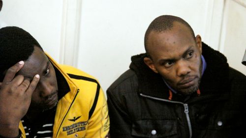 Cyrus Bernard Maina Njuguna, right, and John Njuguna Wathira appear in Kibera law court in Nairobi, Kenya on October 31, 2017. (AAP)