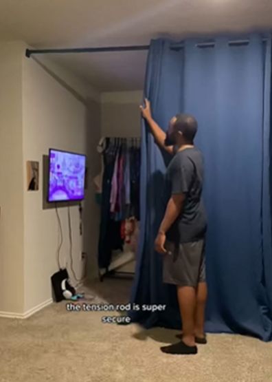 A TikToker shows how they added a curtain to divide a room into a bedroom and living space