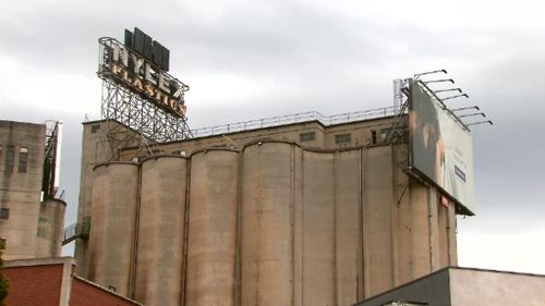 The famous clock is perched on top of silos in Cremorne, overlooking the Yarra River. (9NEWS)