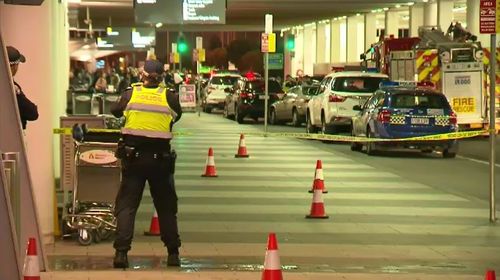 Two adult men and an eight-year-old boy were hit by the car when the driver mounted the kerb at the airport's drop-off zone. Picture: 9NEWS.