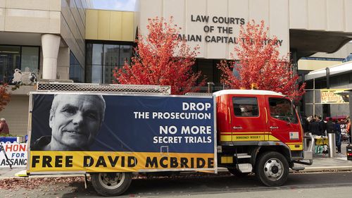 Demonstrators rallying outside court in support of David McBride.