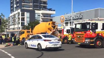 A woman was run over by a cement truck in Wollongong, south of Sydney, this morning.