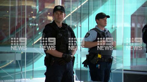 Police at Canberra Airport following a shooting