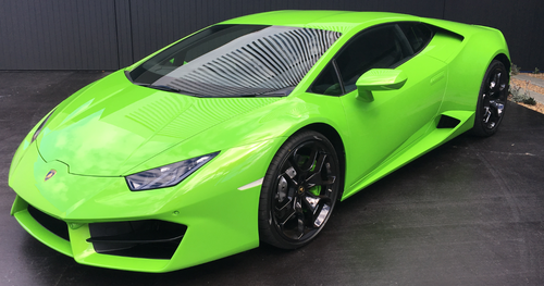 A $460,000 Lamborghini Huracan in Verde Mantis comes with the property.