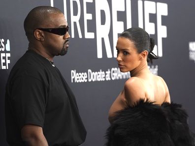 Kanye West, left, and Bianca Censori arrive at the 67th annual Grammy Awards on Sunday, Feb. 2, 2025, in Los Angeles. 