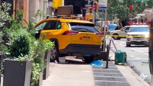 Six people were injured, including three critically, when a taxi jumped onto the footpath on Broadway in Manhattan.