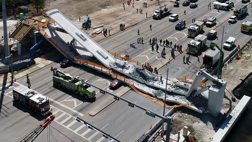 The death toll from a pedestrian bridge collapse in the outskirts of Miami, Florida yesterday has reached six, although authorities believe that number could rise as the rubble is removed (AAP).