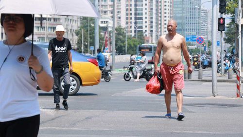 Beijing bikini ban: China cracks down on male toplessness