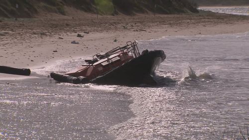 Three men rescued from treacherous waters at Point Lonsdale near Melbourne after their rig became stranded on a reef.
