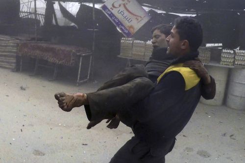 Civil defence workers did their best to help those wounded by the airstrike. (Syrian Civil Defense White Helmets via AP)