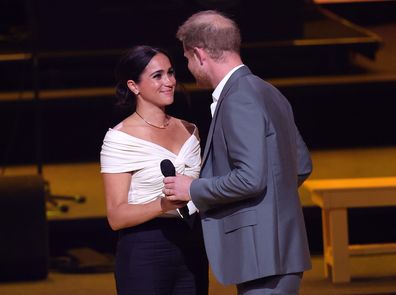 Prince Harry, Duke of Sussex and Meghan, Duchess of Sussex on stage during the Invictus Games The Hague 2020 Opening Ceremony at Zuiderpark on April 16, 2022 in The Hague, Netherlands. (Photo by Chris Jackson/Getty Images for the Invictus Games Foundation )