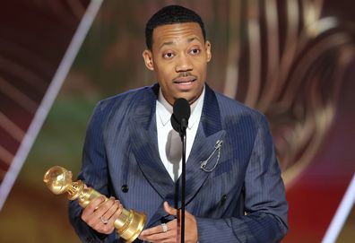 Tyler James Williams accepts the Best Supporting Actor in a Television Series  Musical-Comedy or Drama award for "Abbott Elementary" onstage at the 80th Annual Golden Globe Awards 