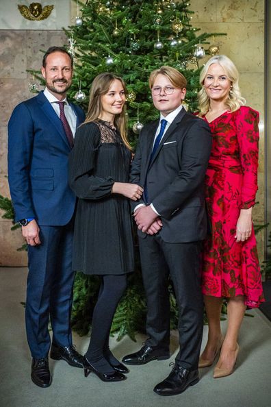 The Norway royal family from left, Crown Prince Haakon, Princess Ingrid Alexandra, Prince Sverre Magnus and Crown Princess Mette-Marit pose for a Christmas photo at the Royal Palace in Oslo