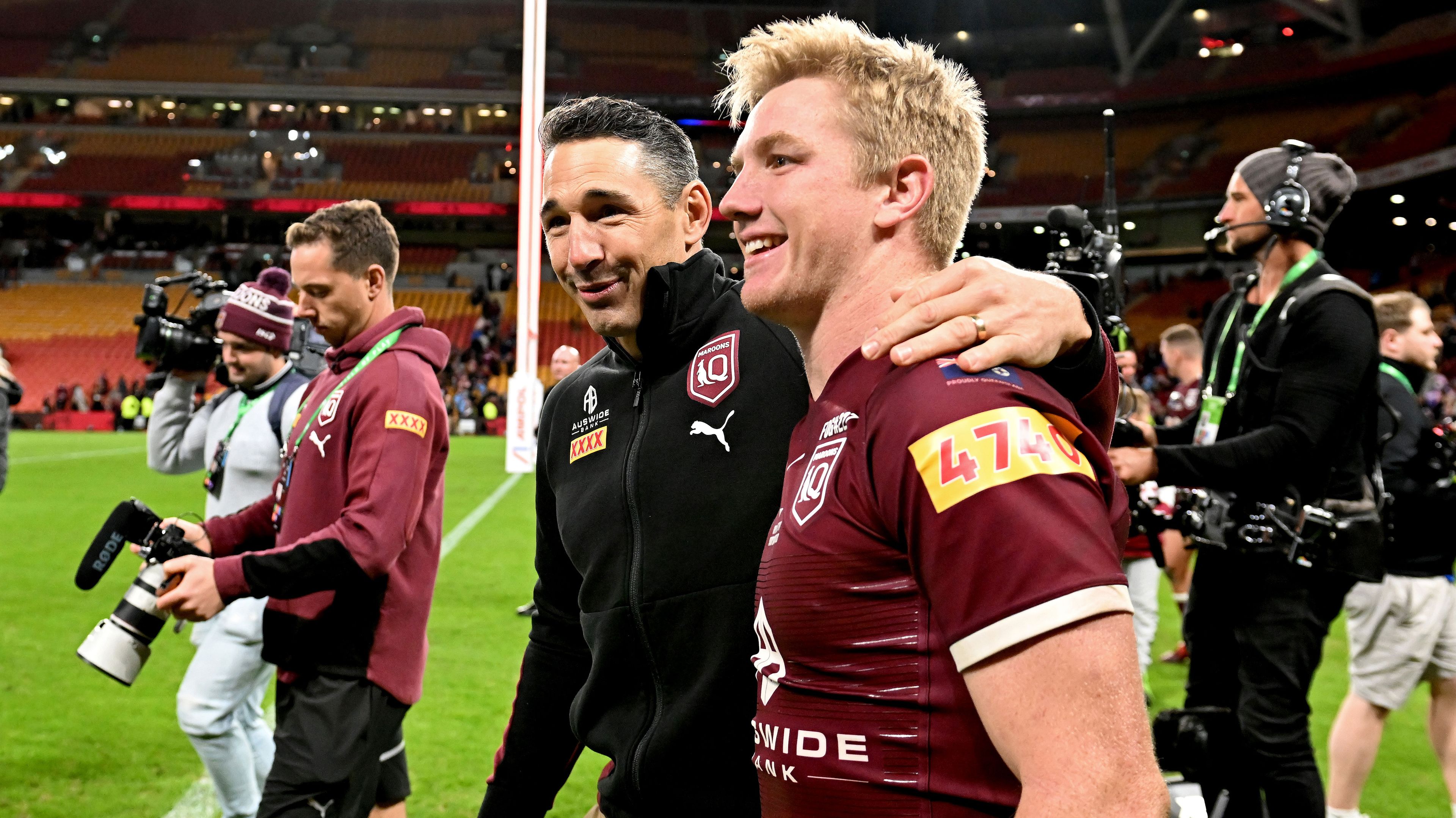 Billy Slater celebrates Queensland&#x27;s series win with Origin rookie Tom Dearden after game three, 2022. 