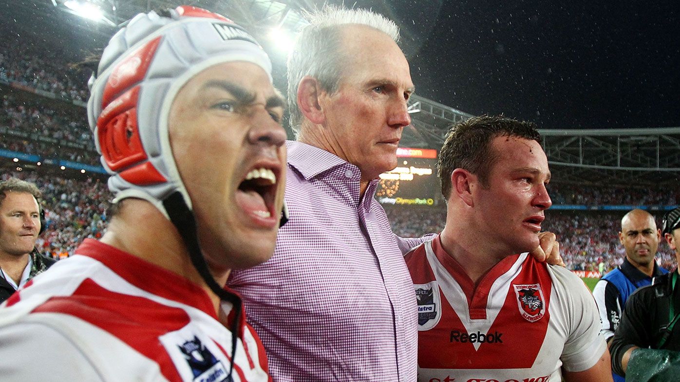 Wayne Bennett celebrates with Jamie Soward and Dean Young after the Dragons&#x27; 2010 NRL Premiership. (Getty)