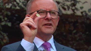 In May 2022 Albanese waved a $1 coin in Adelaide, declaring, &quot;It&#x27;s not bad luck, but bad policy that wages aren&#x27;t keeping up with the cost of living.&quot;