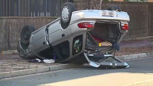 The overturned Subaru. (9NEWS)