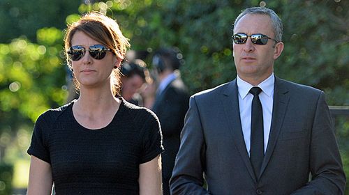 Network Seven's Natalie Barr (2nd from right) and Mark Beretta arrive at the funeral service for television personality Ian "Roscoe" Ross in 2014. (AAP)