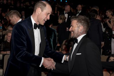 Prince William, Prince of Wales, president of Bafta speaks with David Beckham at the Bafta Film Awards 2024.
