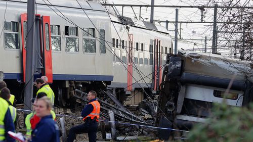 One dead and 20 injured after passenger train derails near Brussels