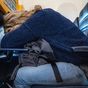 The best position for sleeping on a plane if you're in economy