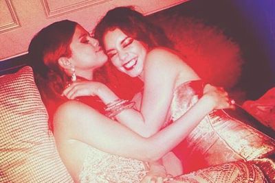 Besties for life! Selena Gomez and Vanessa Hudgens share a smooch post-Oscars.