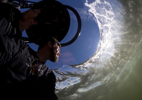 Two pilots in an Aquatica submarine disappear under the water's surface. The expedition's mission is to further ocean education, conservation and scientific research.