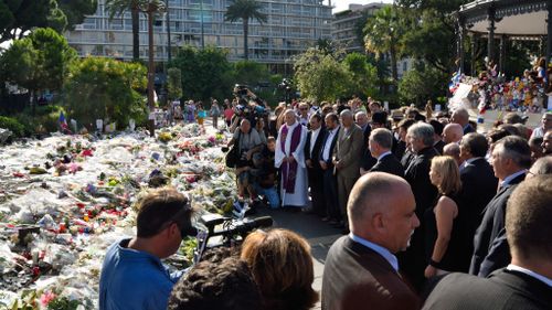 Nice mayor Philippe Pradal and President of the Provence Alpes Cote d'Azur region Christian Estrosi and religious leaders attend a wreath-laying ceremony along the promenade. (AAP)