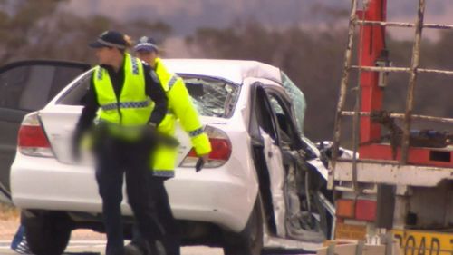 A woman has died, and a man is seriously injured after a crash at a notorious intersection north of Adelaide.