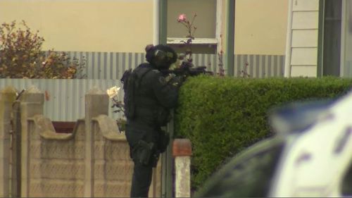 Specially trained police officers then shut down Wallaroo for 24 hours as they searched individual houses for Dohnt. Picture: 9NEWS.