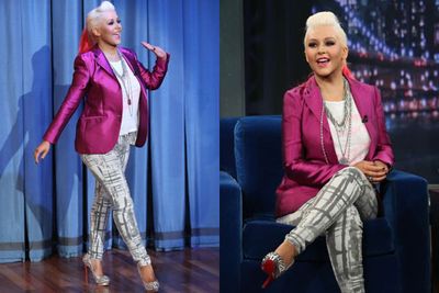 After being called "fatso" by repeat offender Joan Rivers on <I>Up Late with Jimmy Fallon</i>, the 32-year-old covered up her curves for her chat with the comedian.