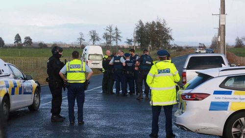 Police surround the site where the campervan was abandoned.