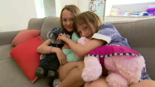 The sisters told 9News they adore their special gifts given to them from police.