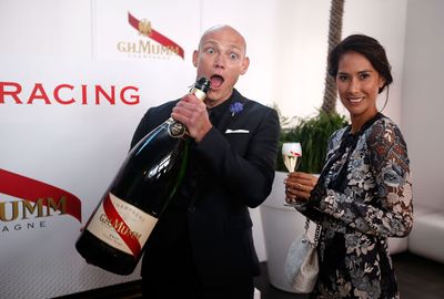 Former Olympian Michael Klim clowns around with his wife Lindy. (Getty)