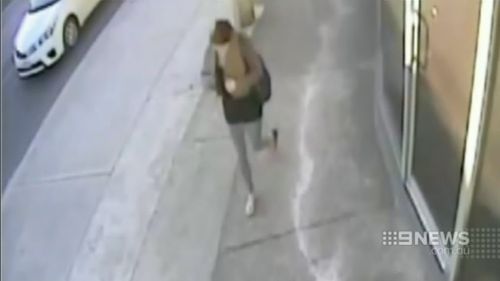 The woman was caught on CCTV shortly after the alleged attack. (9NEWS)