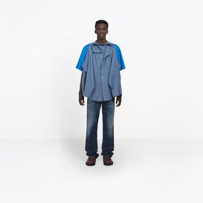 <p>Just because you can't stop staring, here's another one.</p>
<p><a href="https://www.balenciaga.com/us/shirts_cod38757019tm.html" target="_blank" draggable="false">Balenciaga's T-Shirt Shirt,</a> $1,700</p>