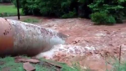 Road is swept away by flood waters in Texas (Facebook/Allen N Laneigh Childers)