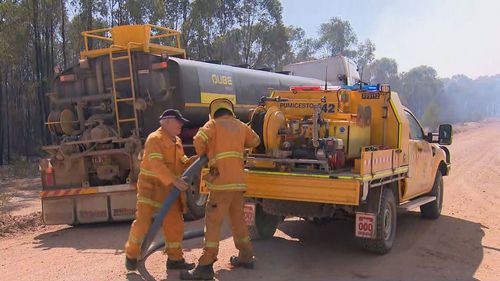 Twenty-fire trucks have been sent to the Tara fire, where favourable weather conditions have given crews the opportunity to consolidate containment lines.