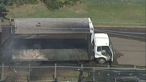 Semi-trailer bursts into flames after hitting powerlines at Ryde in Sydney's north