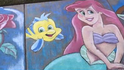 Brian Morris does Disney chalk drawings on his street footpath in Florida