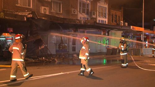 Firefighters at the scene of the fire. (9NEWS)